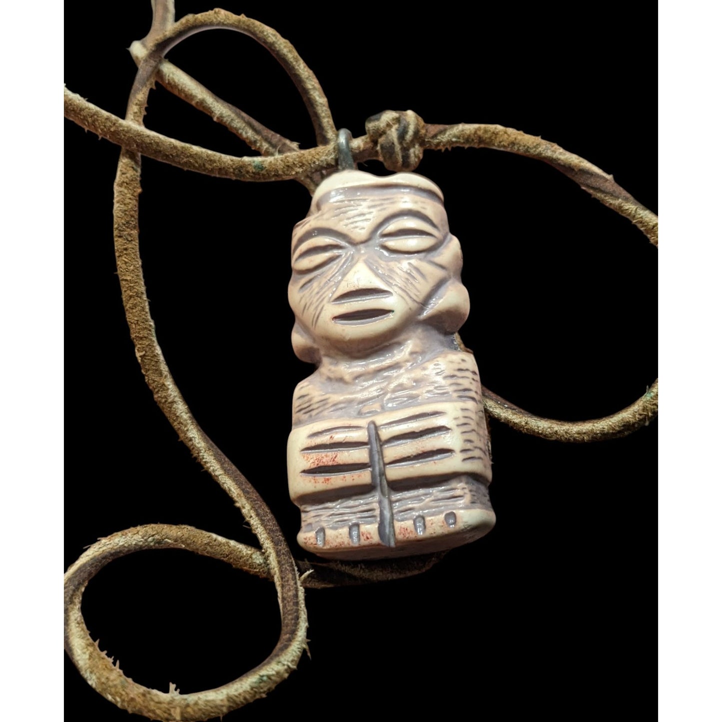 Tribal Pendant Necklace With Unique Figure Carving On Brown Suede Cord