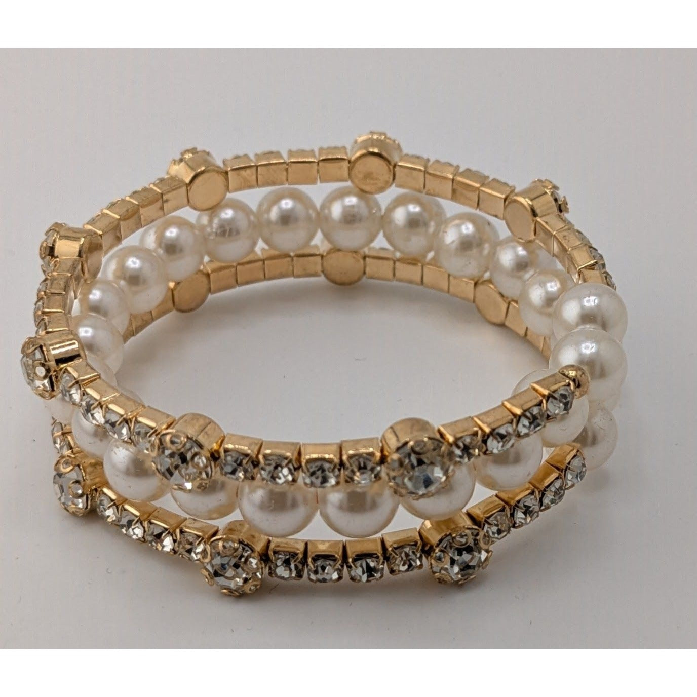 Elegant Gold Tone & Faux Pearl Coil Bracelet With Rhinestone Accents