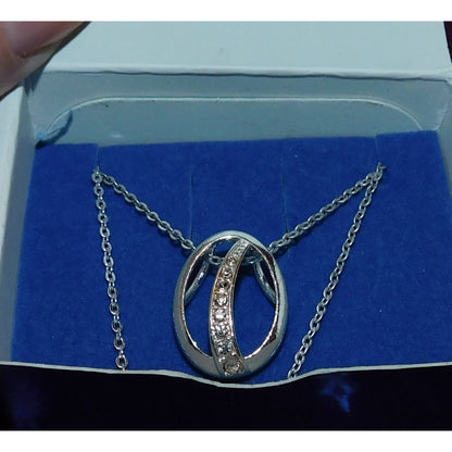 Avon "Believe In Love" Silver Tone Pendant Necklace