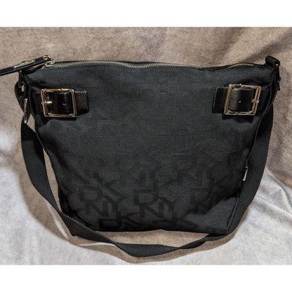DKNY Black Canvas Shoulder Bag With Buckle Accents & Zip Closure