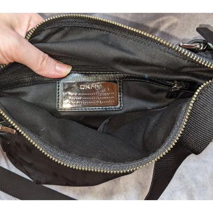 DKNY Black Canvas Shoulder Bag With Buckle Accents & Zip Closure
