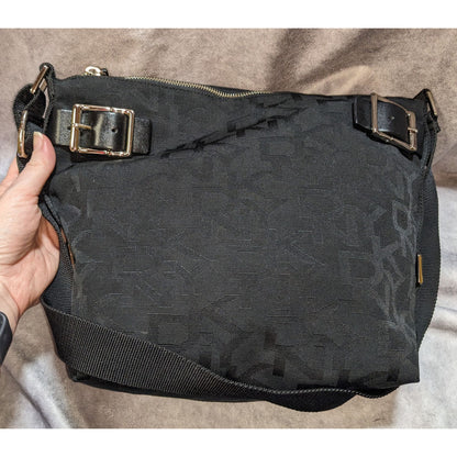 DKNY Black Canvas Shoulder Bag With Buckle Accents & Zip Closure