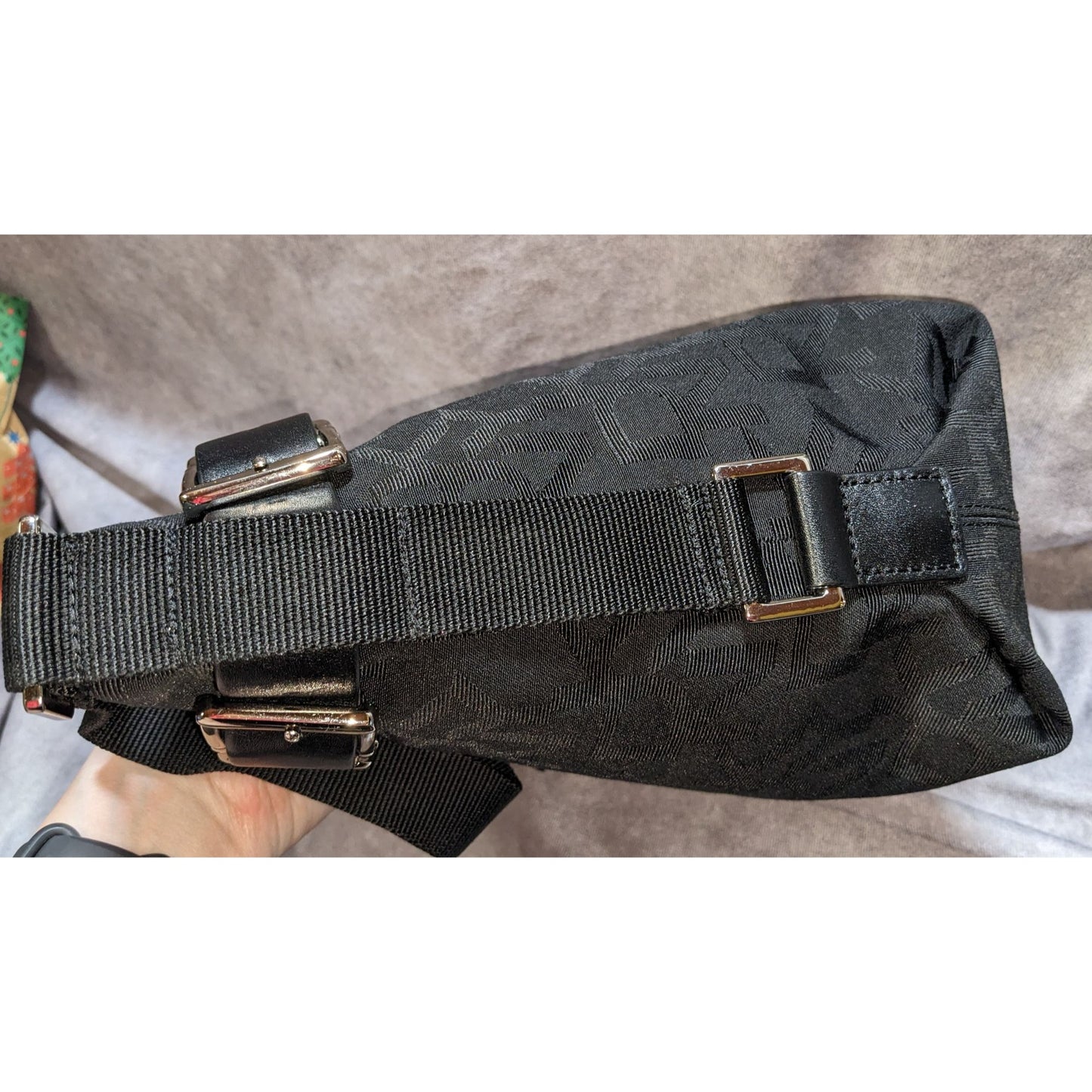 DKNY Black Canvas Shoulder Bag With Buckle Accents & Zip Closure