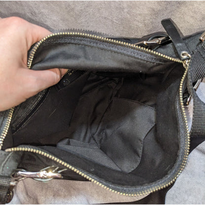 DKNY Black Canvas Shoulder Bag With Buckle Accents & Zip Closure