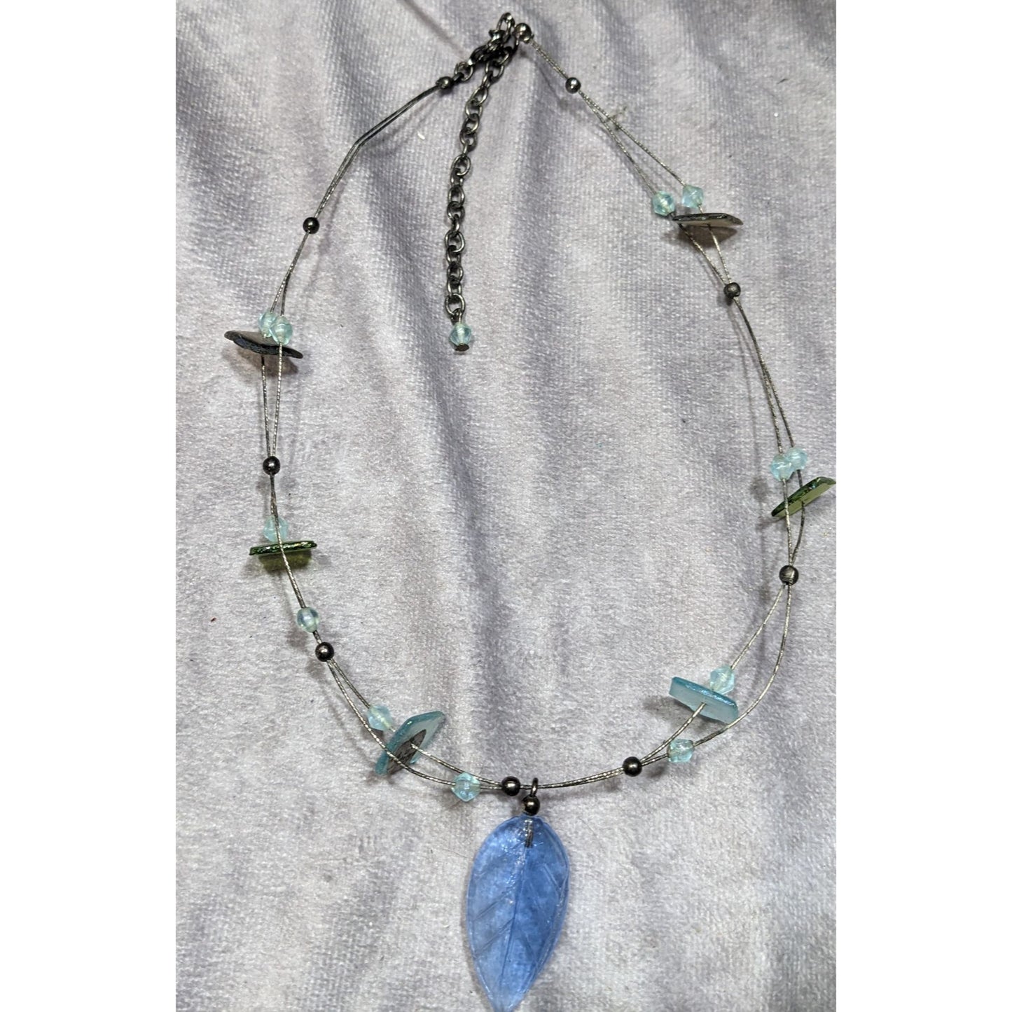 Handcrafted Necklace With Blue Glass Leaf Pendant & Green Accent Beads On Silver Wire Chain