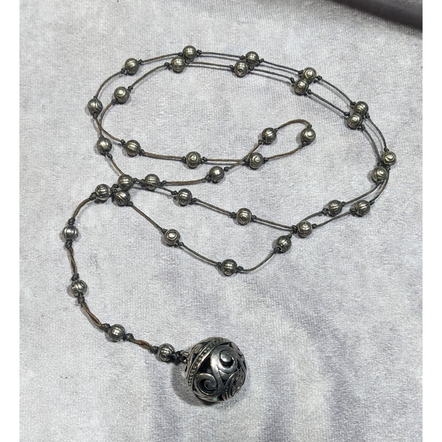 Vintage Silver Tone Beaded Station Necklace With Floral Engraved Ball Pendant