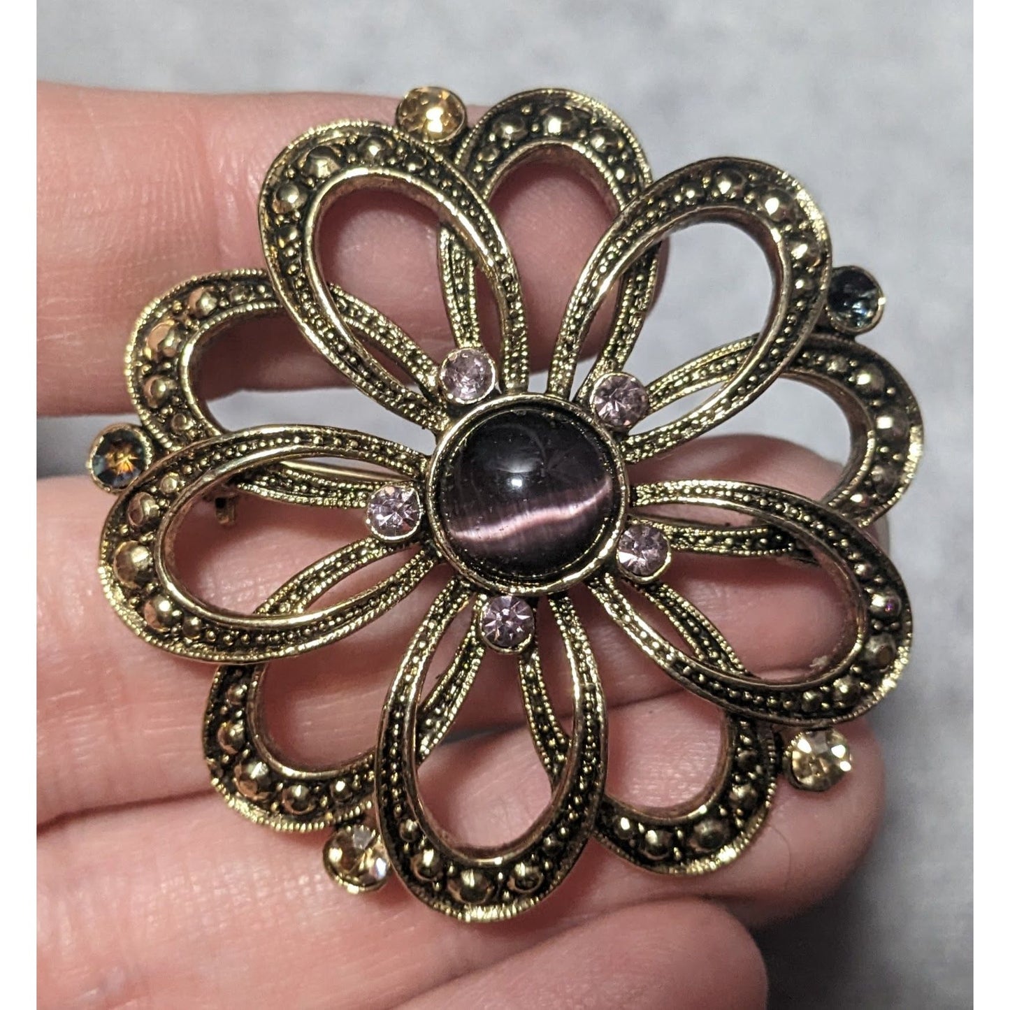 Vintage Whimsical Gold Tone Purple Gemmed Flower Brooch