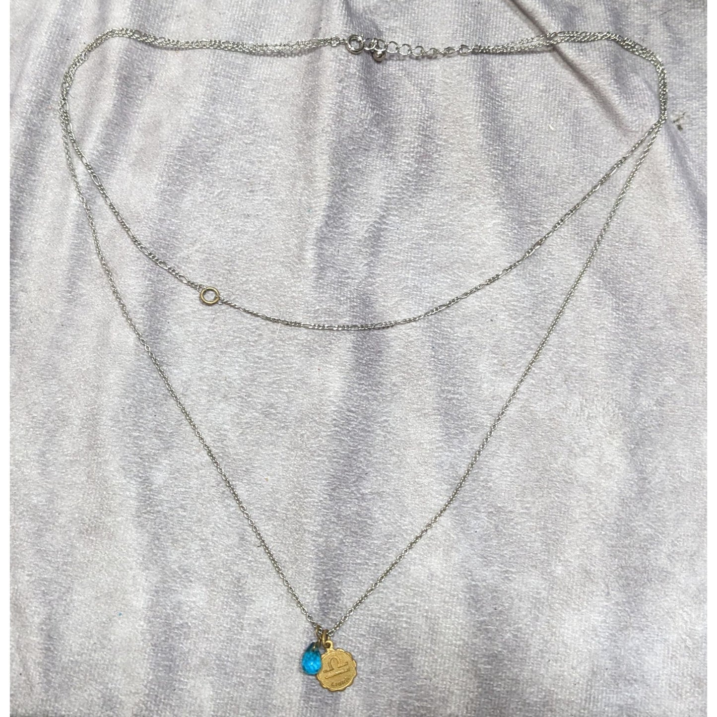 Libra Zodiac Layered Necklace With Gold Tone Pendant & Blue Bead On Silver Chain