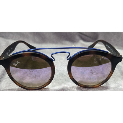 Ray-Ban 4256 Round Tortoise Sunglasses With Blue Accents And Lilac Mirror Lenses