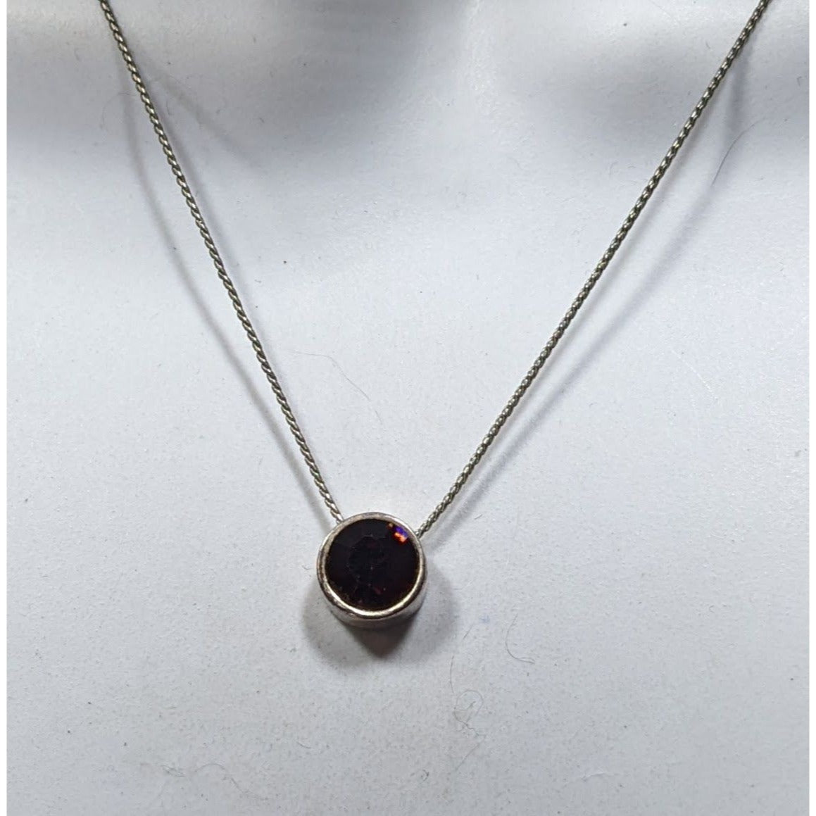Elegant Silver Tone Necklace With Round Purple Gemstone Pendant