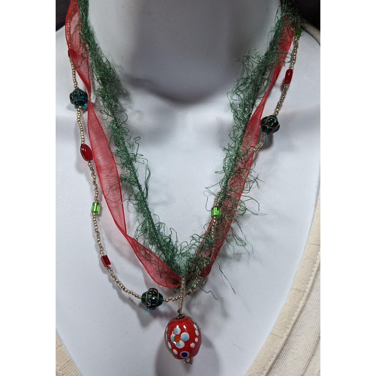 Abstract Floral Holiday Themed Red And Green Pendant Necklace