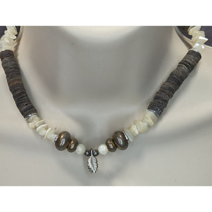 Vintage Beachy Santo Domingo Heishi Necklace With Shell And Mother Of Pearl Beads Featuring A Silver Feather Accent