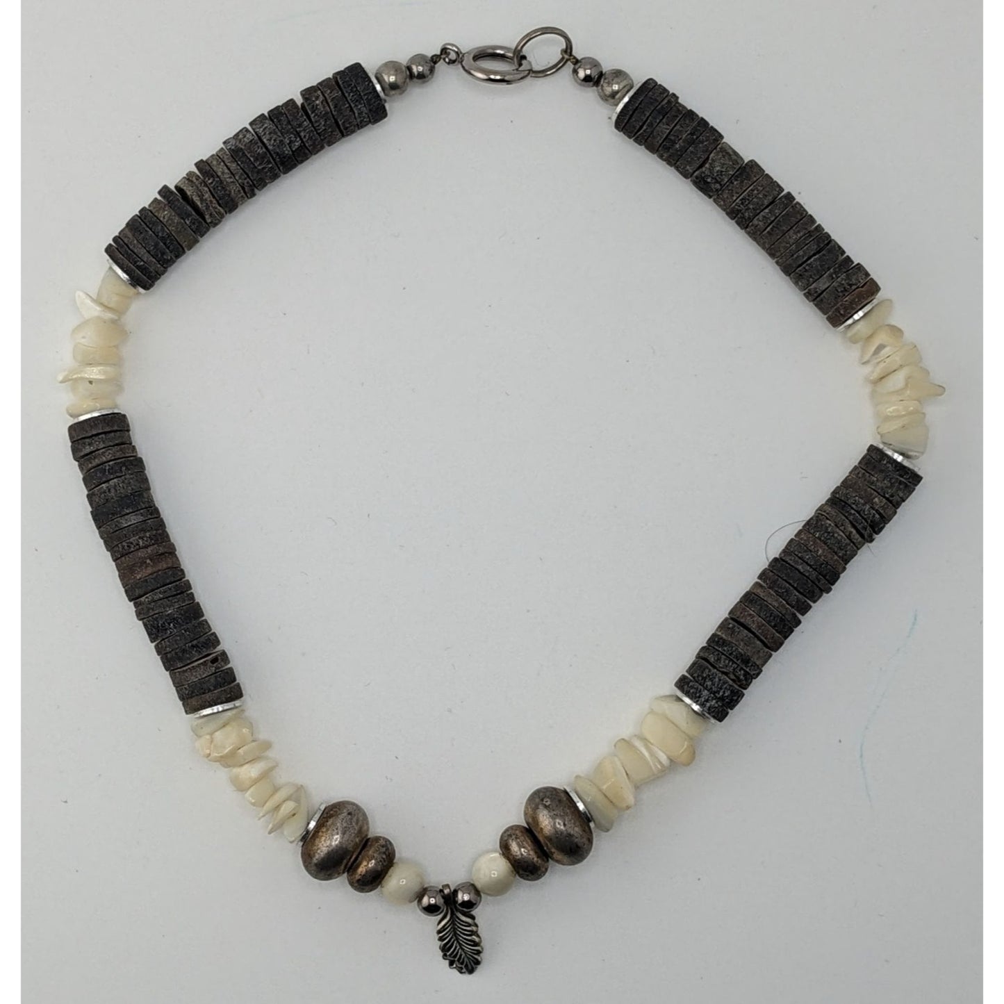 Vintage Beachy Santo Domingo Heishi Necklace With Shell And Mother Of Pearl Beads Featuring A Silver Feather Accent