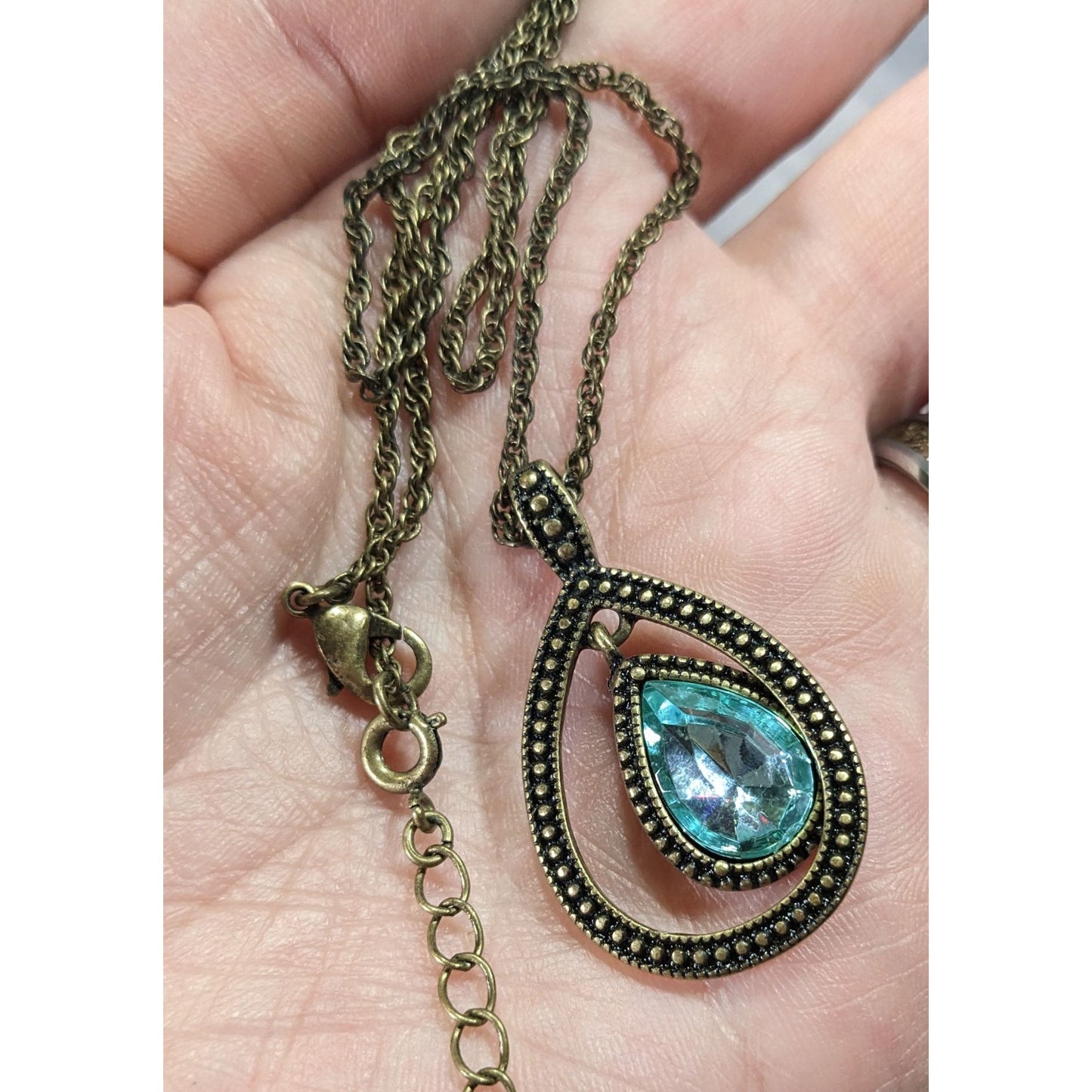 Whimsical Teardrop Blue Gemmed Gold Tone Pendant Necklace