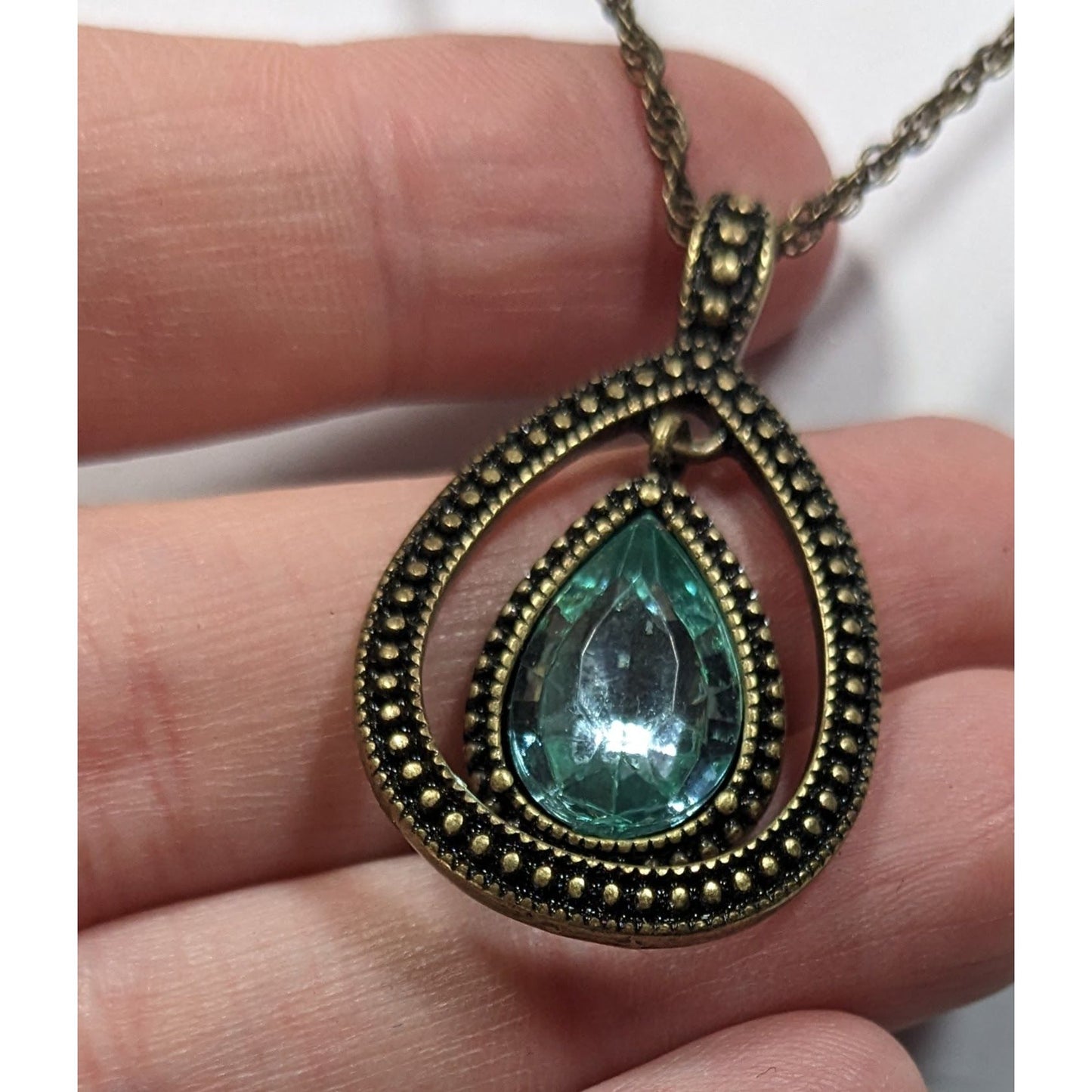 Whimsical Teardrop Blue Gemmed Gold Tone Pendant Necklace