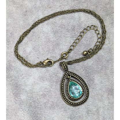 Whimsical Teardrop Blue Gemmed Gold Tone Pendant Necklace