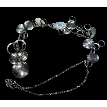 Jingling Disc And Open Circle Charm Silver Tone Necklace