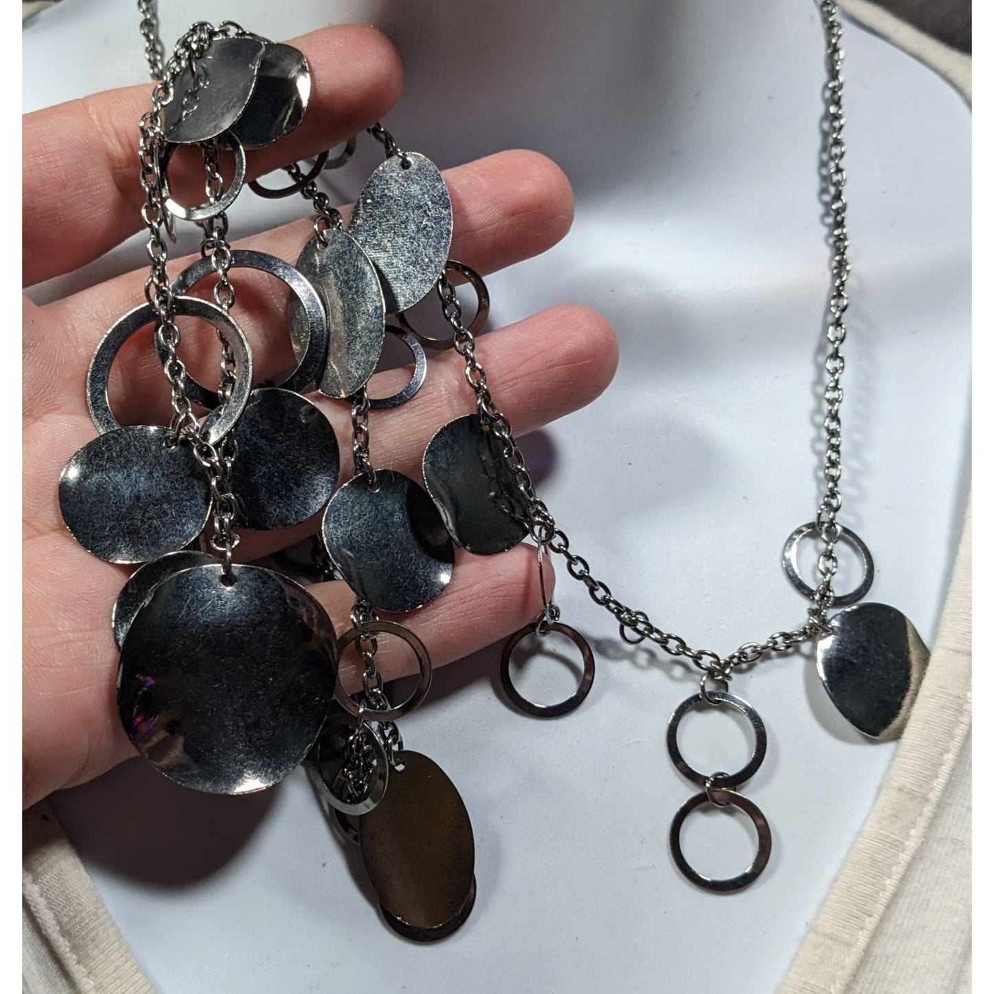 Jingling Disc And Open Circle Charm Silver Tone Necklace