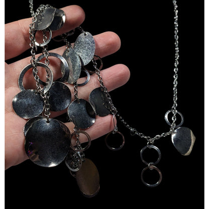 Jingling Disc And Open Circle Charm Silver Tone Necklace