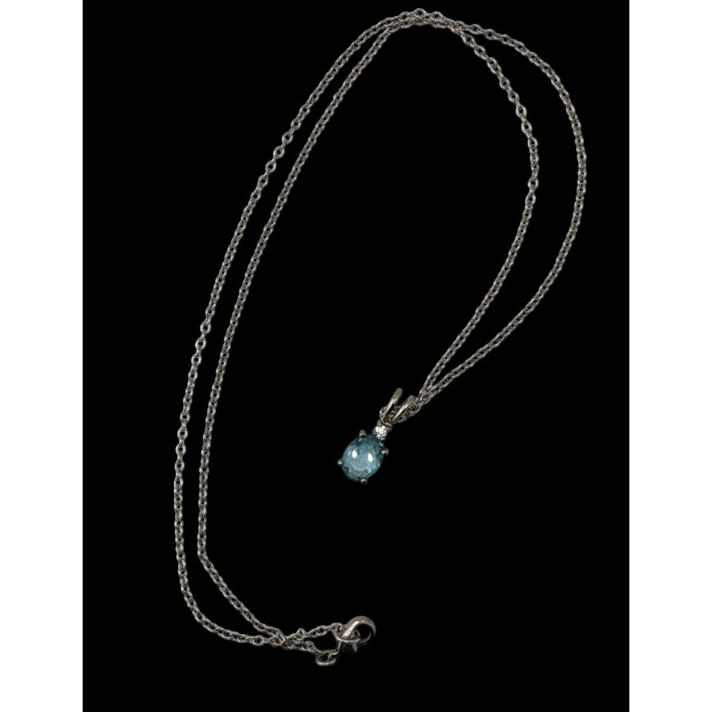 Elegant Silver Tone Necklace With Blue Topaz Oval Pendant And Clear Stone Accent