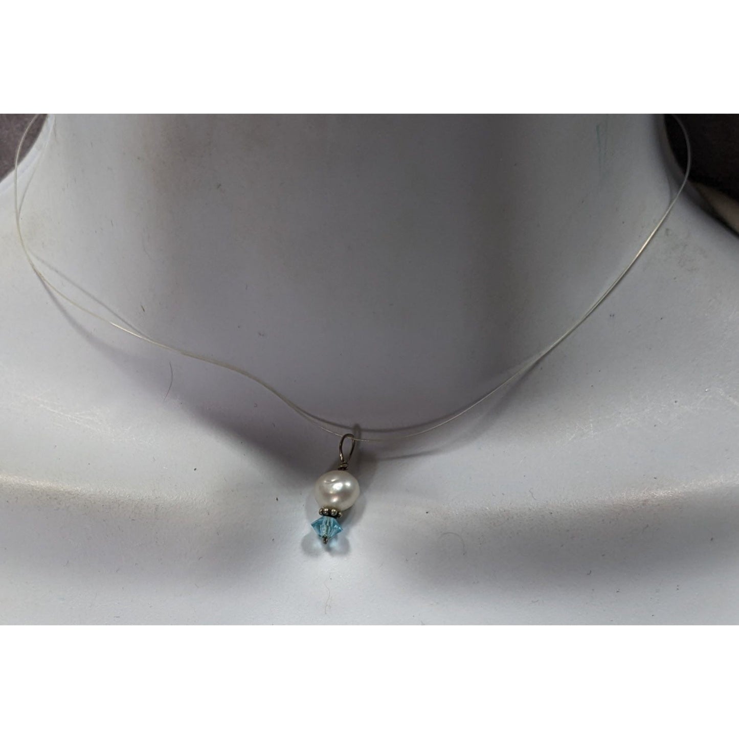 Dainty Pearl & Blue Crystal Pendant On Clear Wire Necklace With Clasp Closure