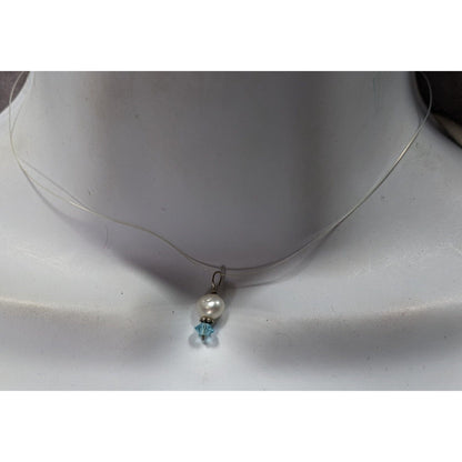 Dainty Pearl & Blue Crystal Pendant On Clear Wire Necklace With Clasp Closure