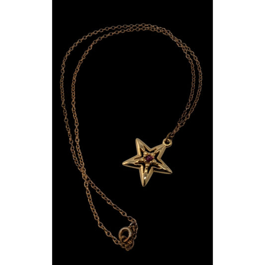 Vintage Whimsical Gold-Tone Star Pendant Necklace With Red Gem Accent