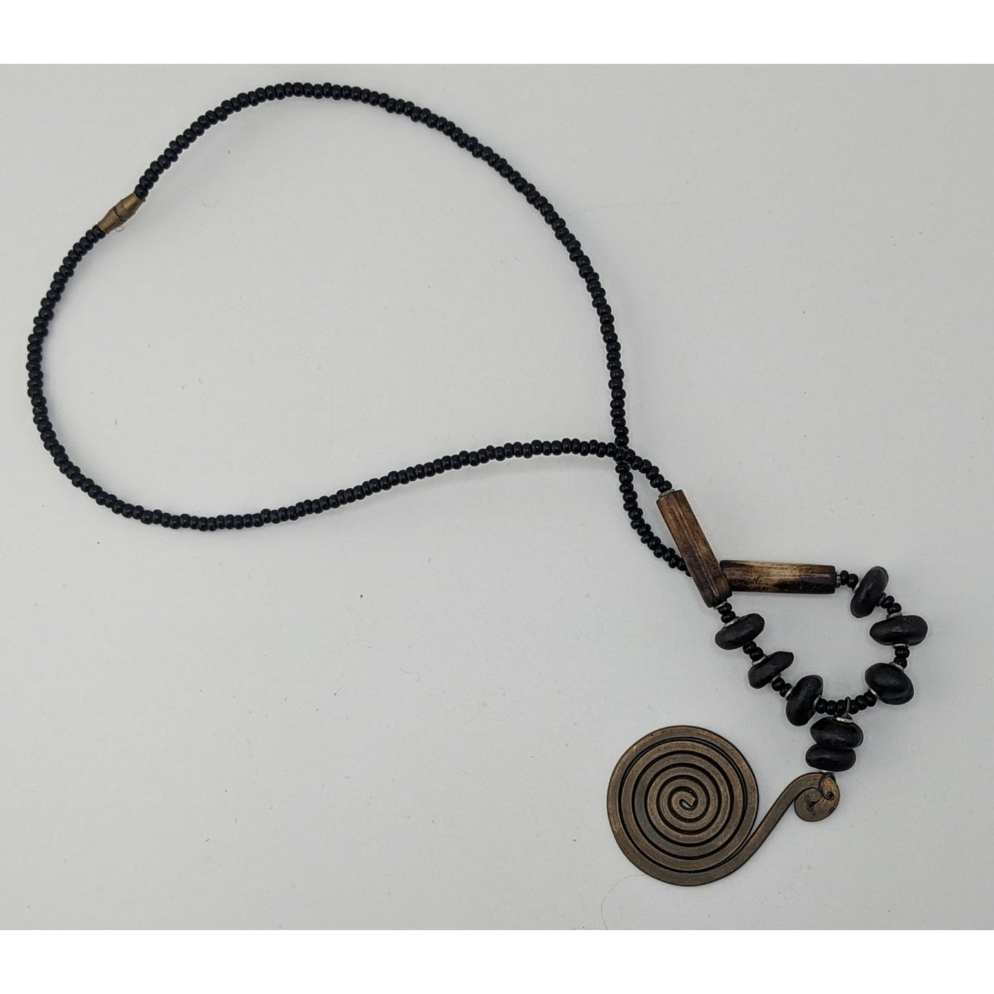 Vintage Tribal Spiral Pendant Necklace With Black Beads Wooden Accents & Barrel Clasp