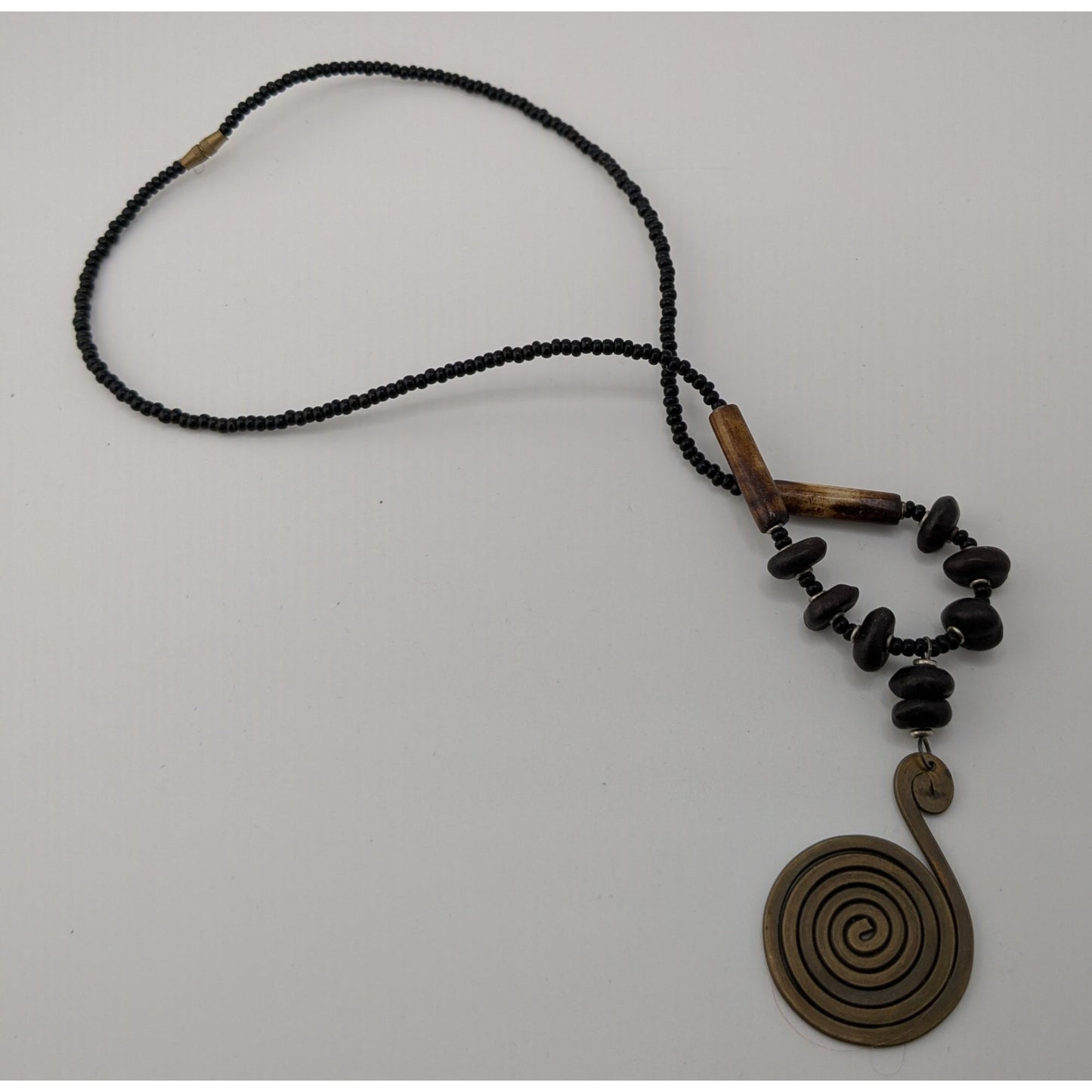 Vintage Tribal Spiral Pendant Necklace With Black Beads Wooden Accents & Barrel Clasp