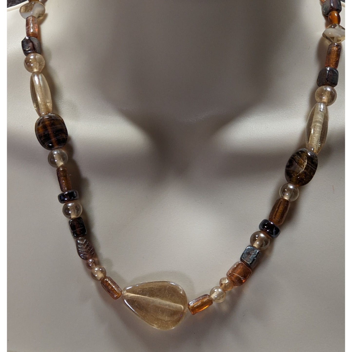 Earthy Glass Beaded Necklace With Teardrop Pendant