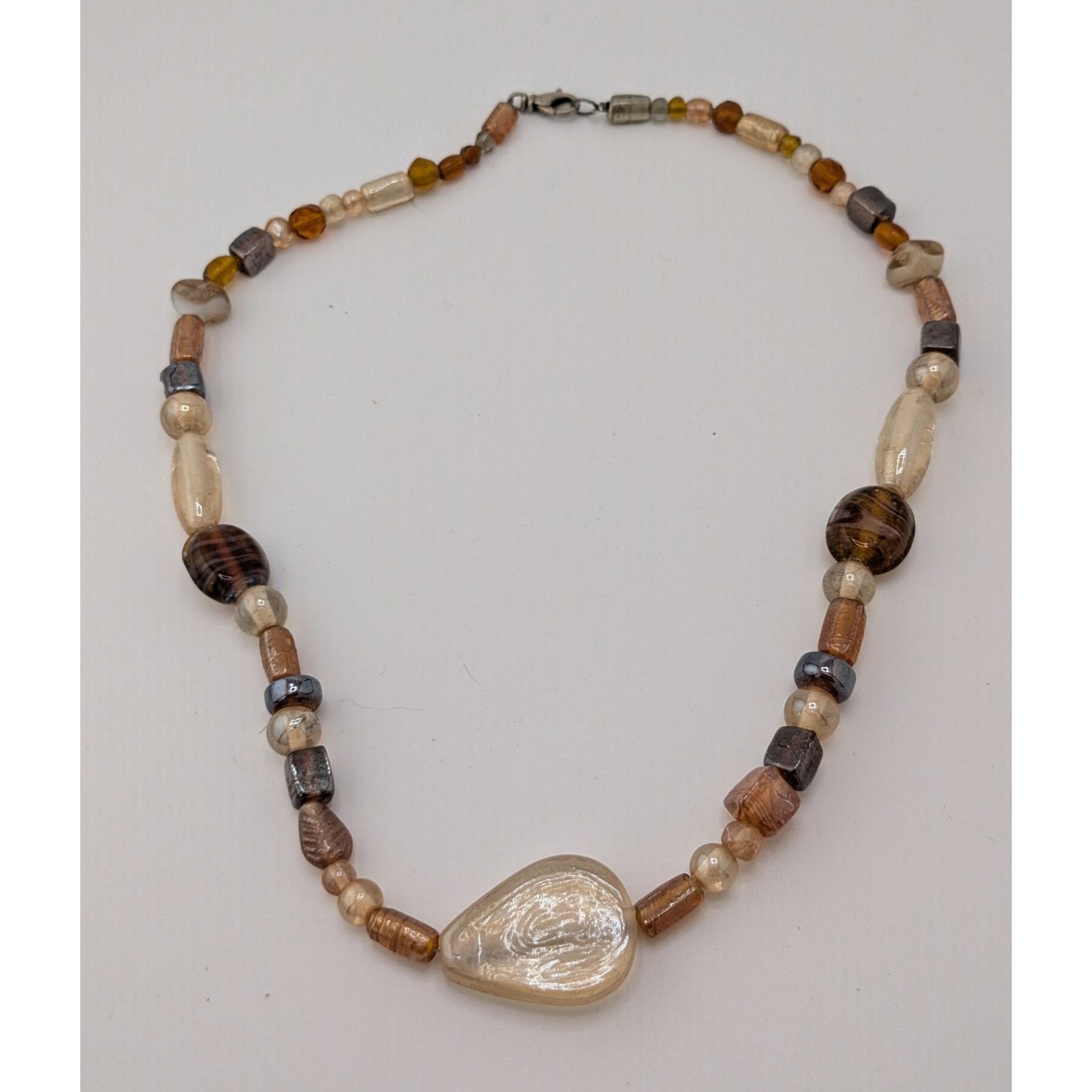 Earthy Glass Beaded Necklace With Teardrop Pendant