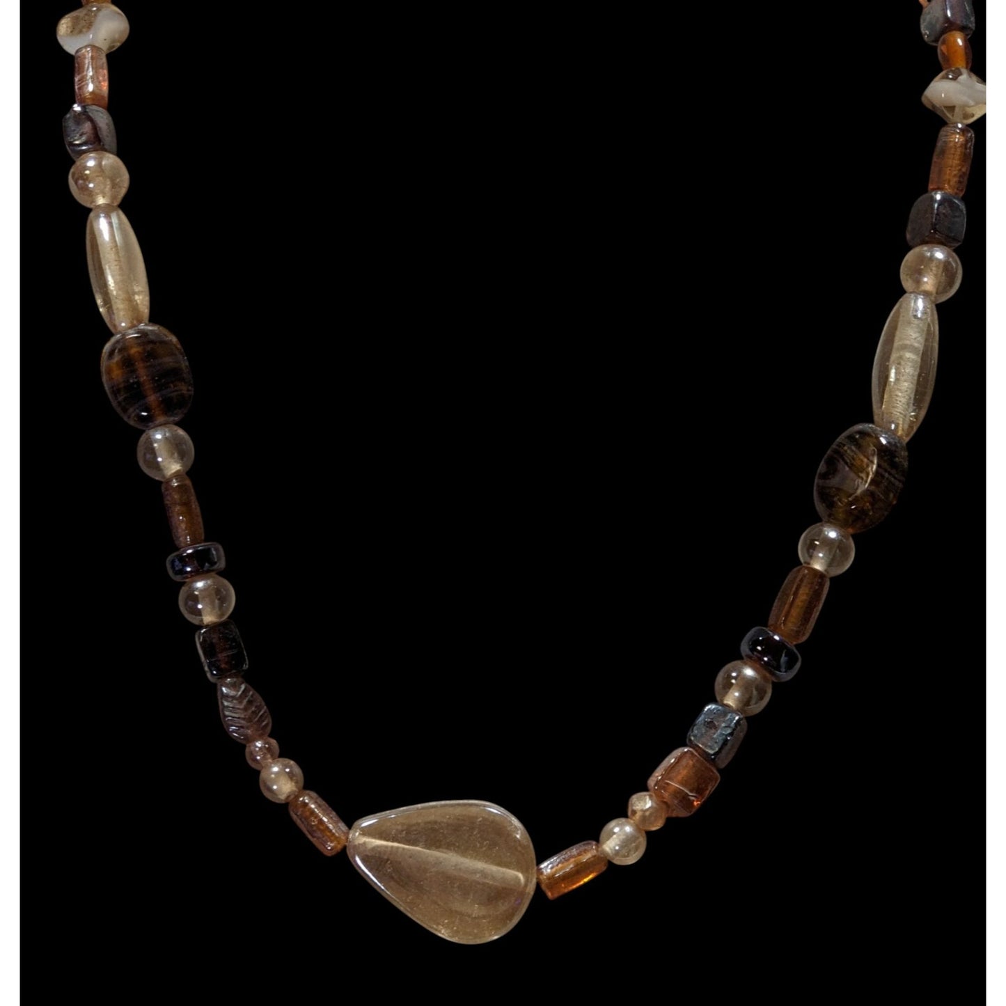 Earthy Glass Beaded Necklace With Teardrop Pendant