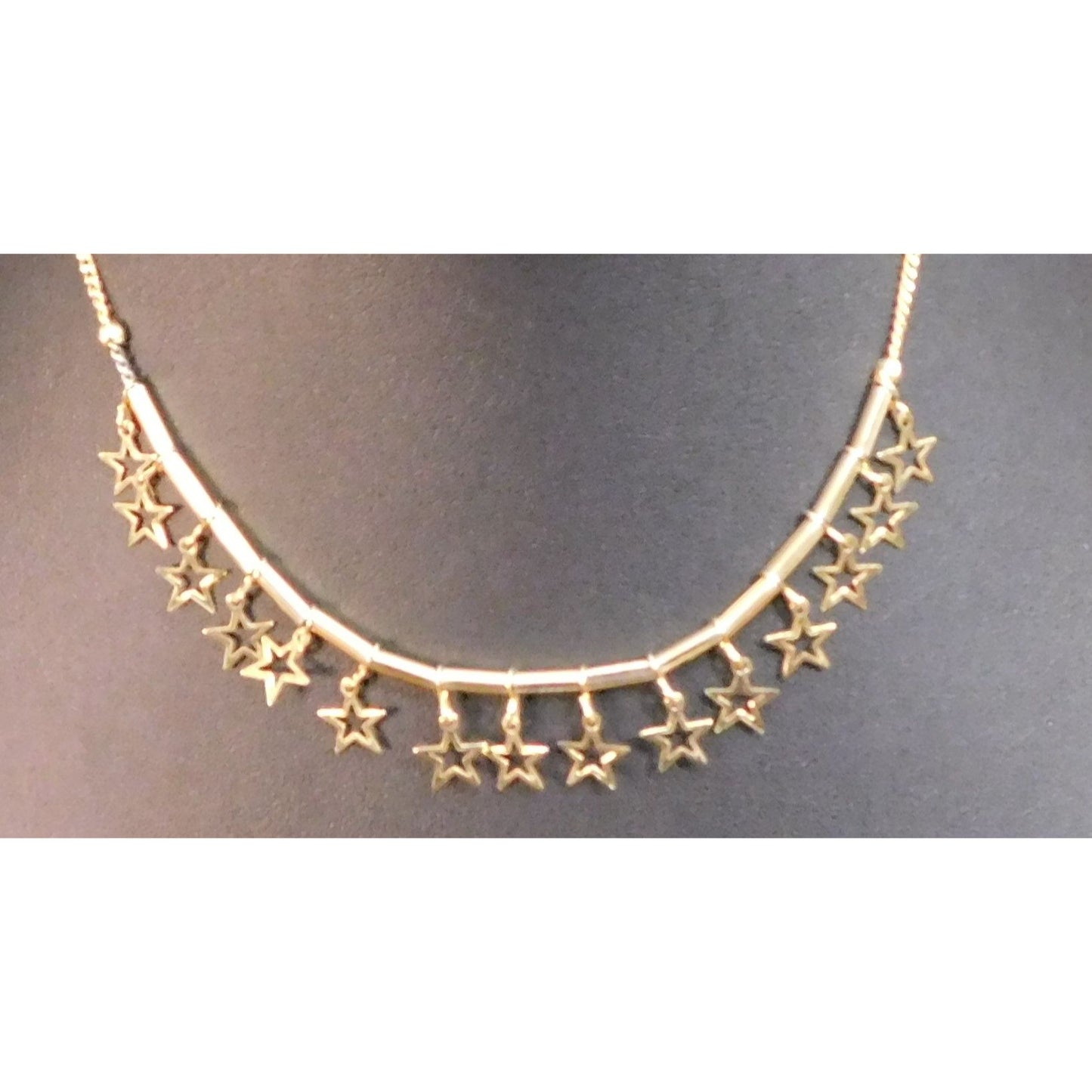 Whimsical Gold Tone Star Charm Necklace