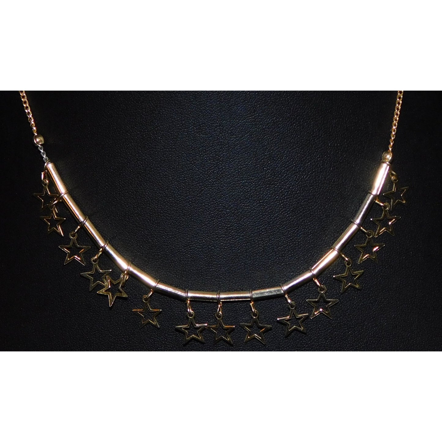 Whimsical Gold Tone Star Charm Necklace