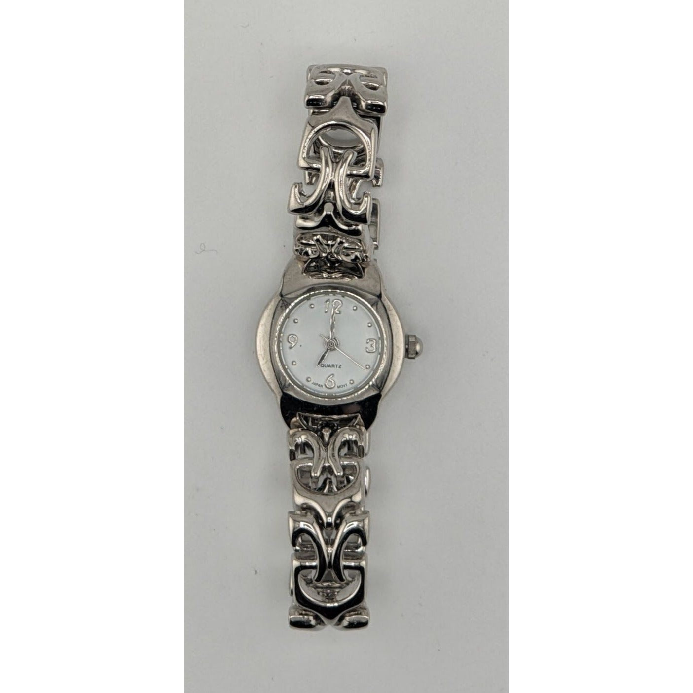 Womens Quartz Watch With Ornate Band & White Face