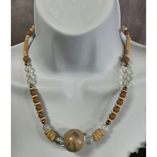 Earth Tone Beaded Necklace With Clear Beads And Large Painted Focal Bead