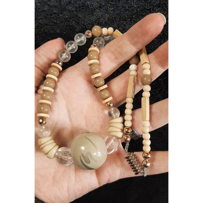 Earth Tone Beaded Necklace With Clear Beads And Large Painted Focal Bead