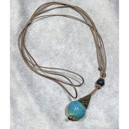 Bohemian Fantasy Blue Ceramic Pendant Necklace On Brown Cord