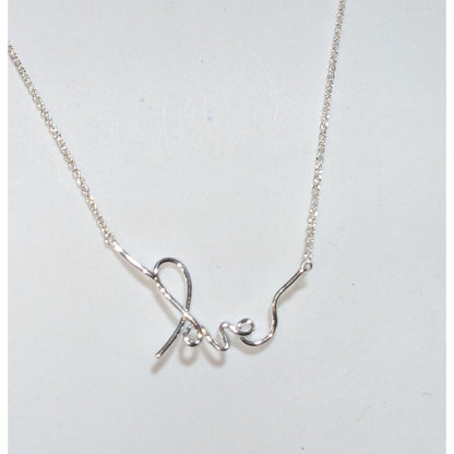 Minimalist Coquette Stella & Dot Love Script Necklace Silver Tone