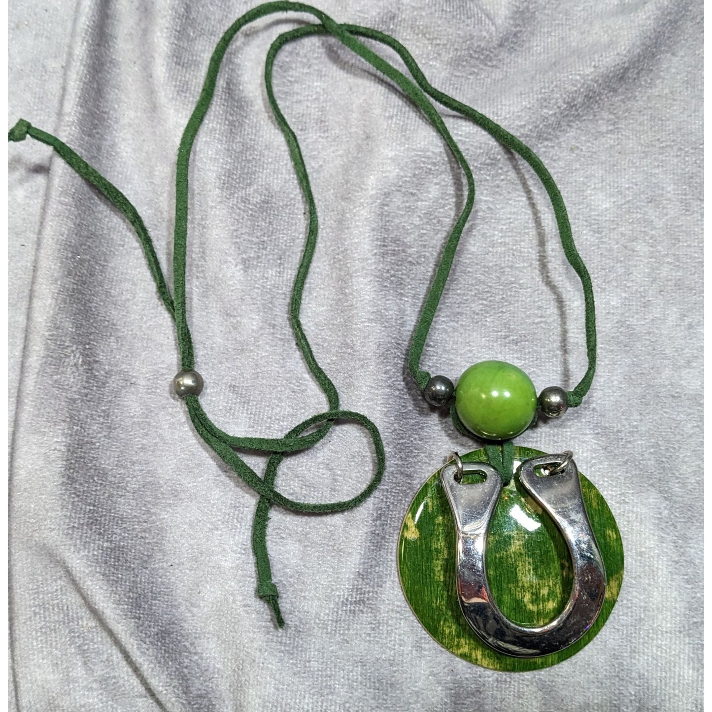 Unique Abstract Horse Shoe Accented Green And Silver Tone Necklace