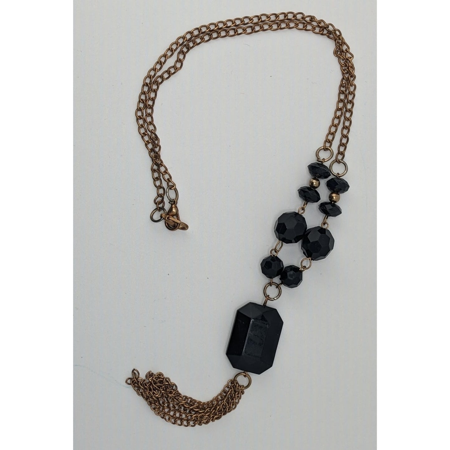 Gold-Tone Chain Necklace With Black Beads And Tassel Pendant