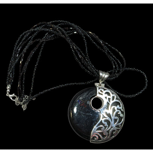 Floral Overlay Black And Silver Tone Pendant Necklace With Black Glass Beads