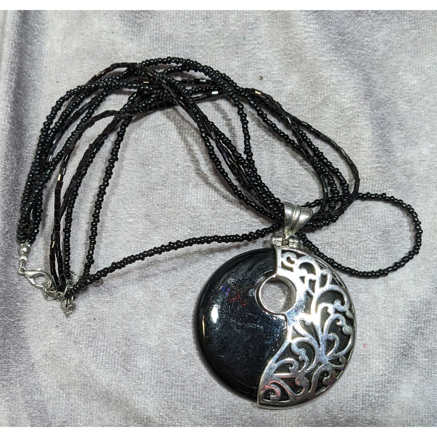 Floral Overlay Black And Silver Tone Pendant Necklace With Black Glass Beads