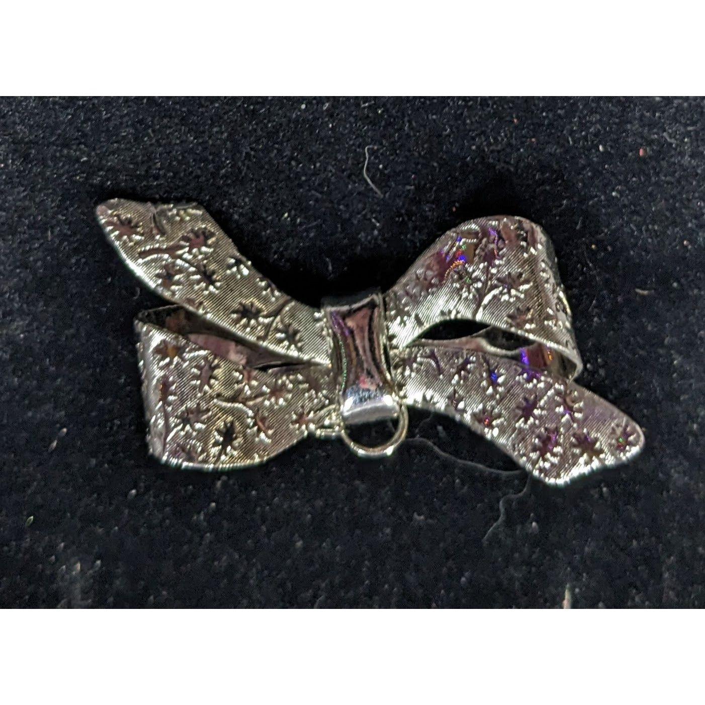 Coquette Floral Embossed Silver Tone Bow Brooch