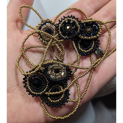 Glass Beaded Necklace Black And Gold Tone With Flower Disc Stations