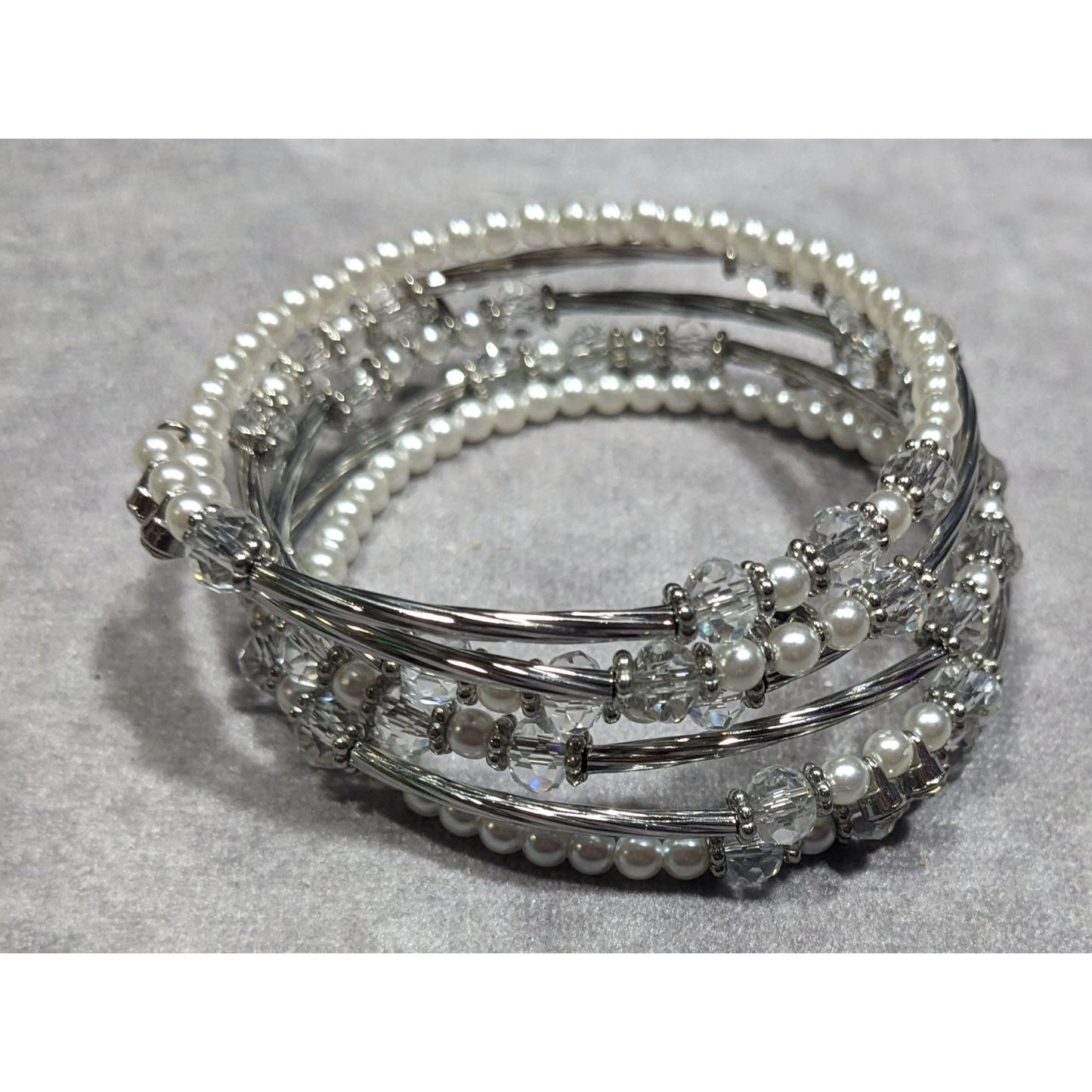 Elegant Glam White And Silver Tone Beaded Coil Bracelet