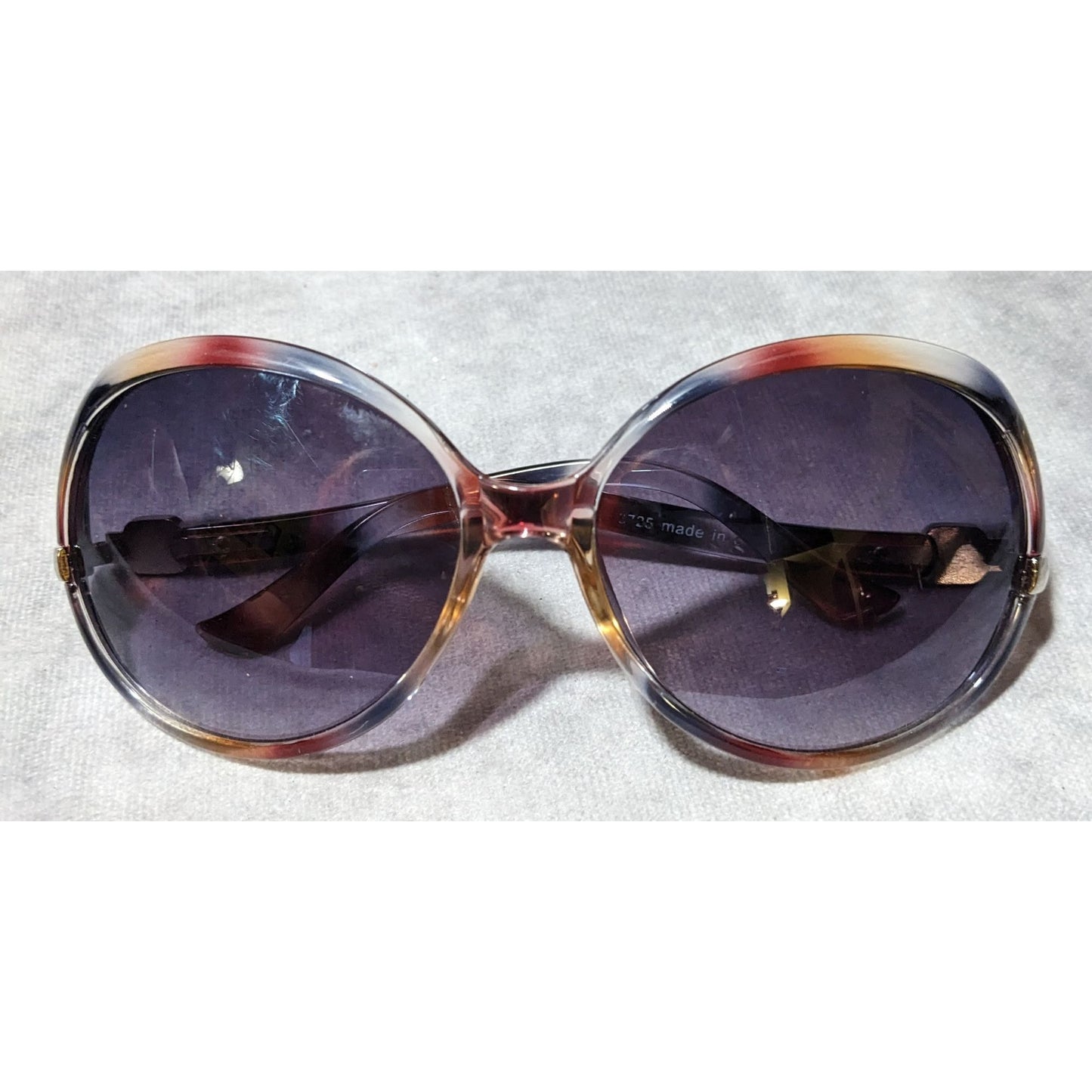 Vintage Baskin Bros. Mottled Red Black And Clear Sunglasses