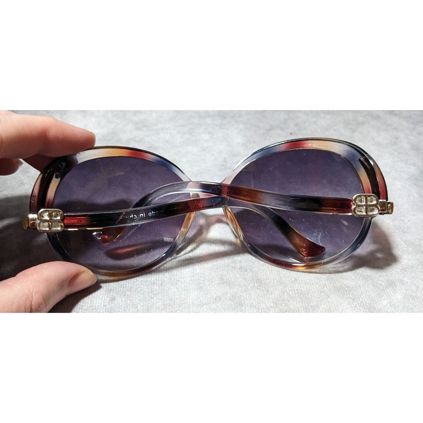 Vintage Baskin Bros. Mottled Red Black And Clear Sunglasses