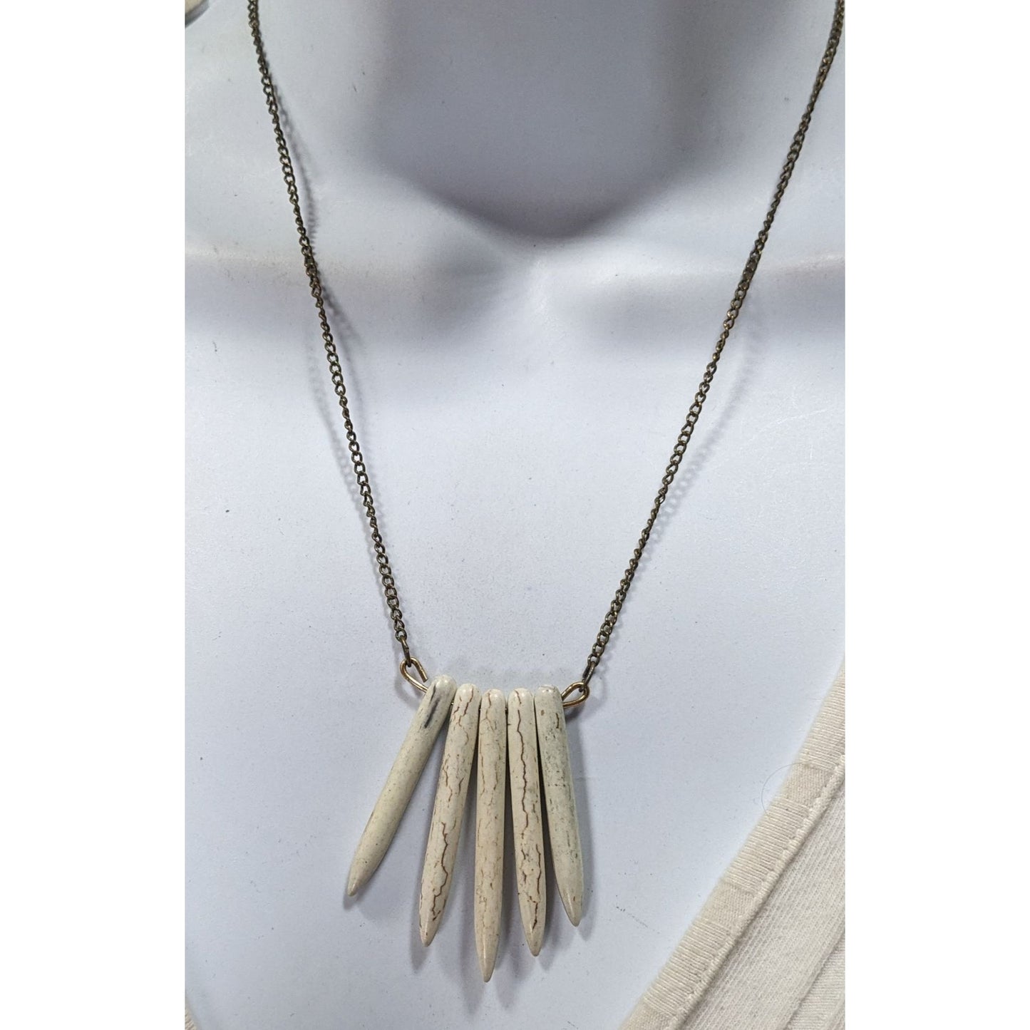 Howlite Graduated Spike White And Gold Tone Pendant Necklace