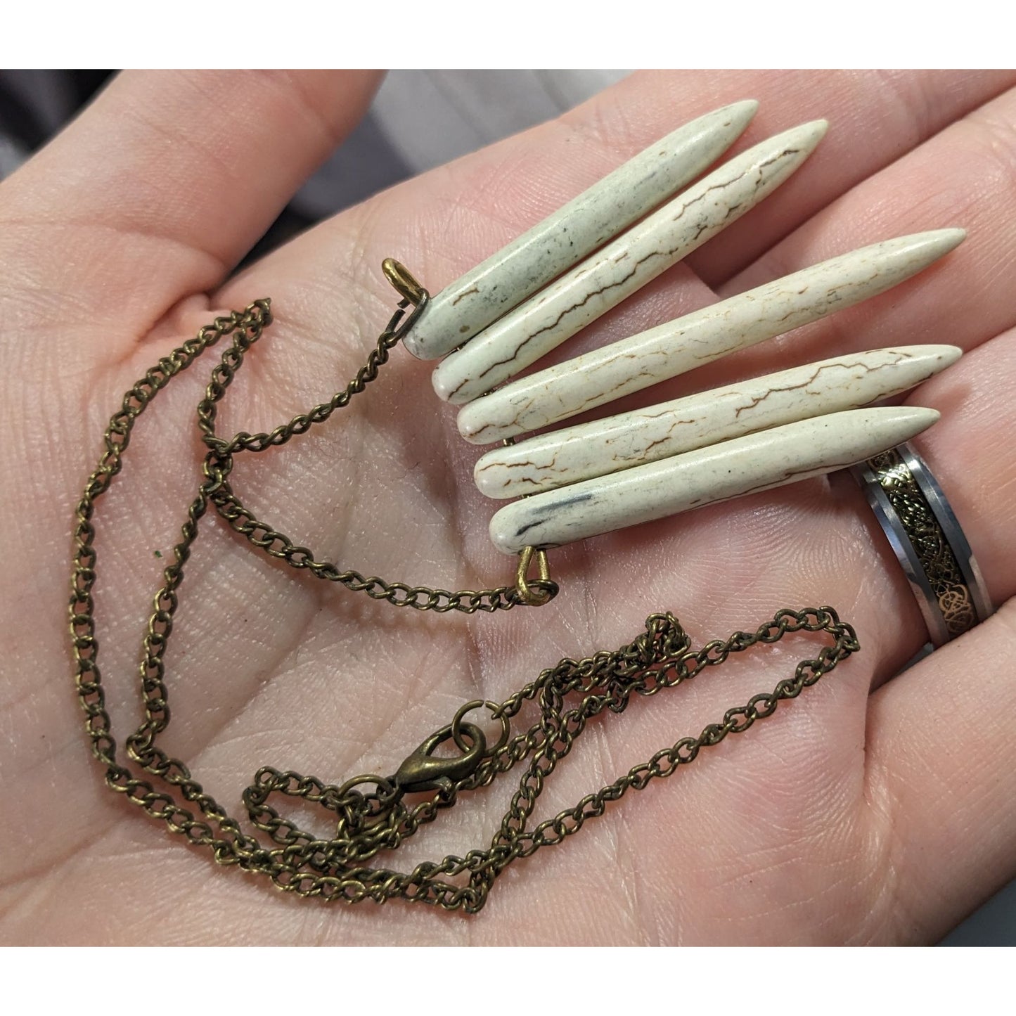 Howlite Graduated Spike White And Gold Tone Pendant Necklace
